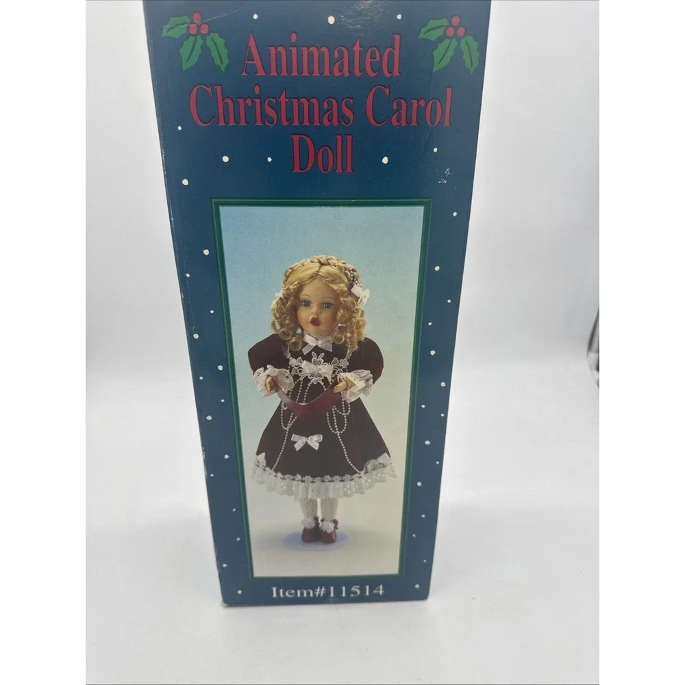 Animated Christmas Carol Doll‎